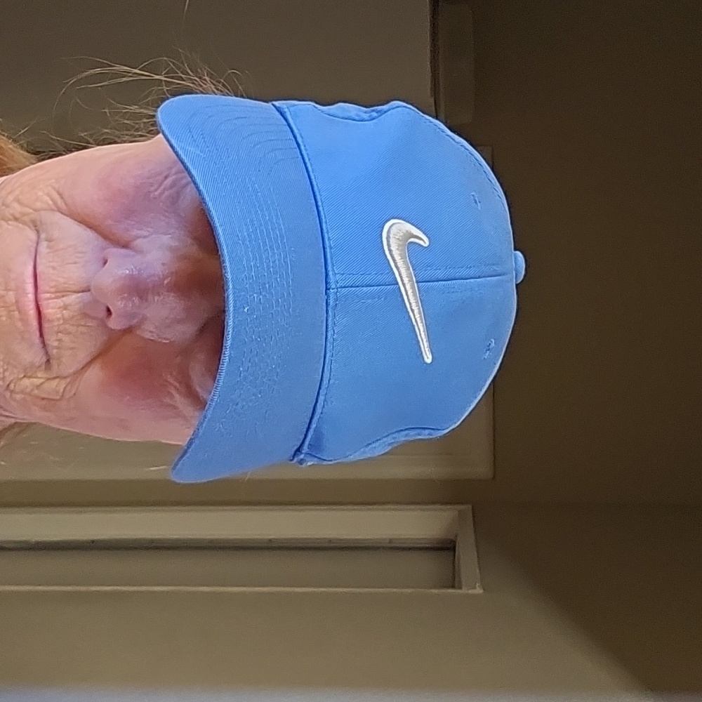 Nike ball cap with swooch.  Tote 5.